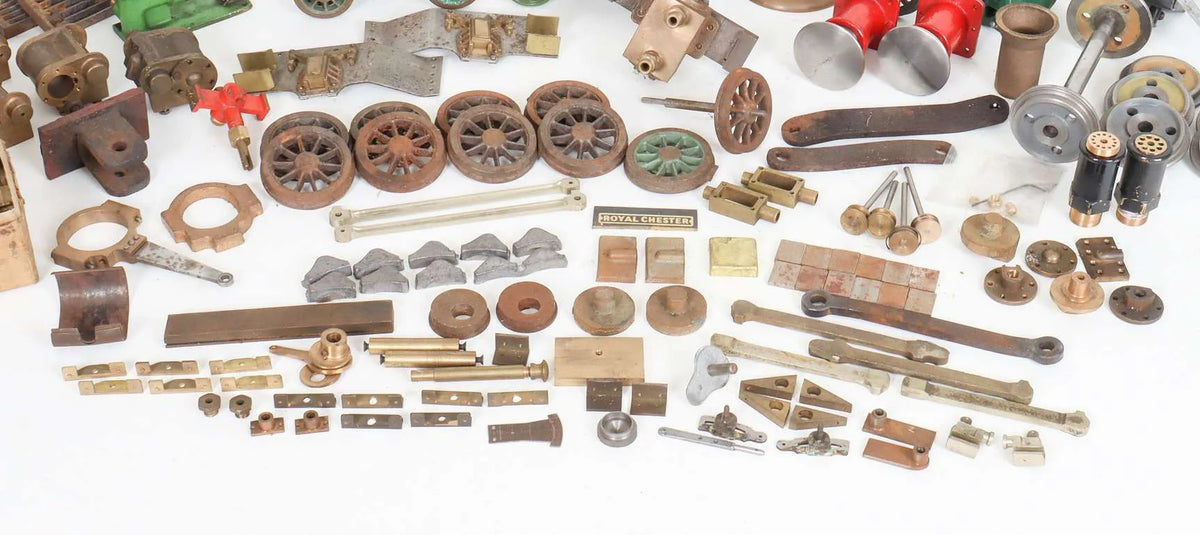 Large box of assorted parts and castings