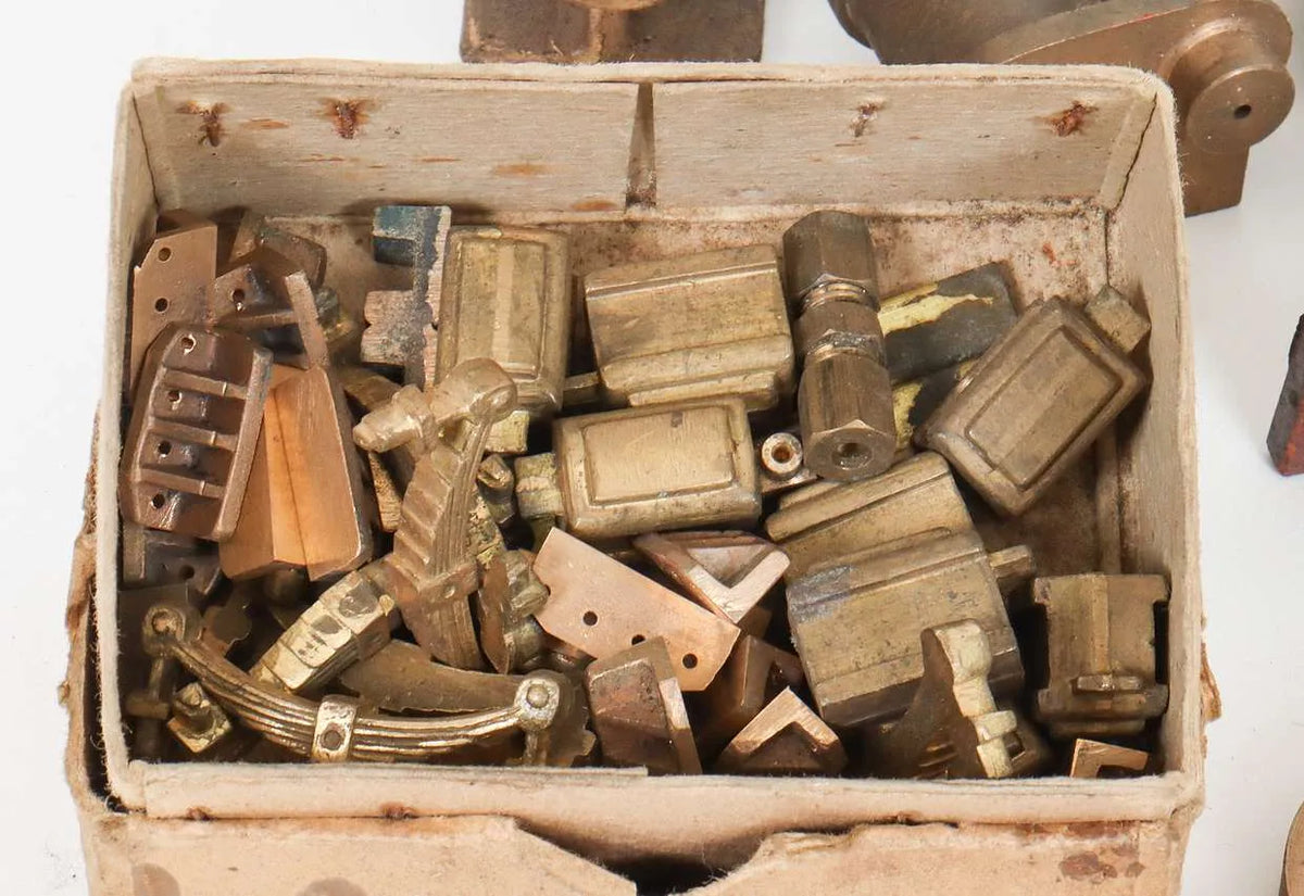 Large box of assorted parts and castings