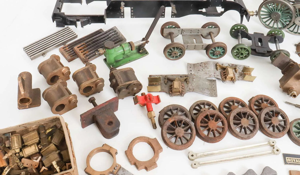 Large box of assorted parts and castings