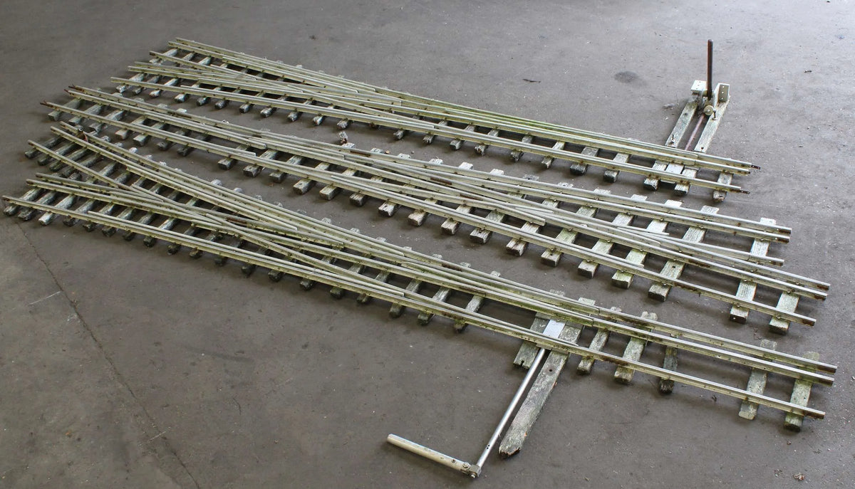 Three multi-gauge 3 1/2 & 5 inch turnouts