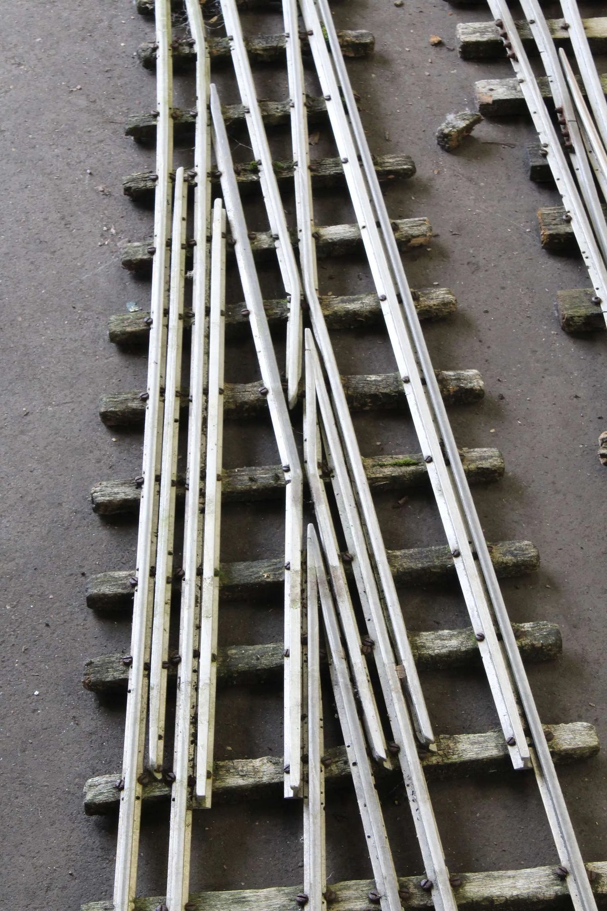Three multi-gauge 3 1/2 & 5 inch turnouts
