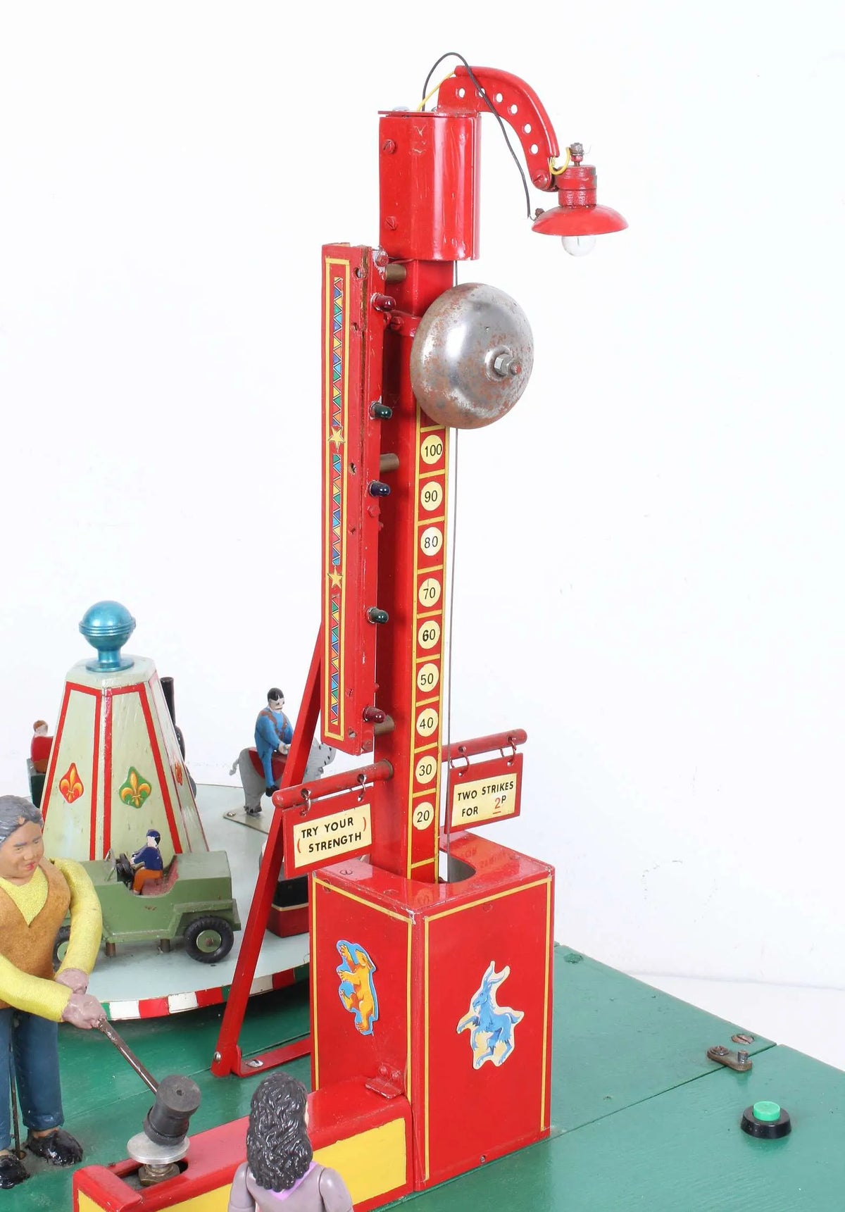 Fairground "Test your Strength" stall & juvenile roundabout