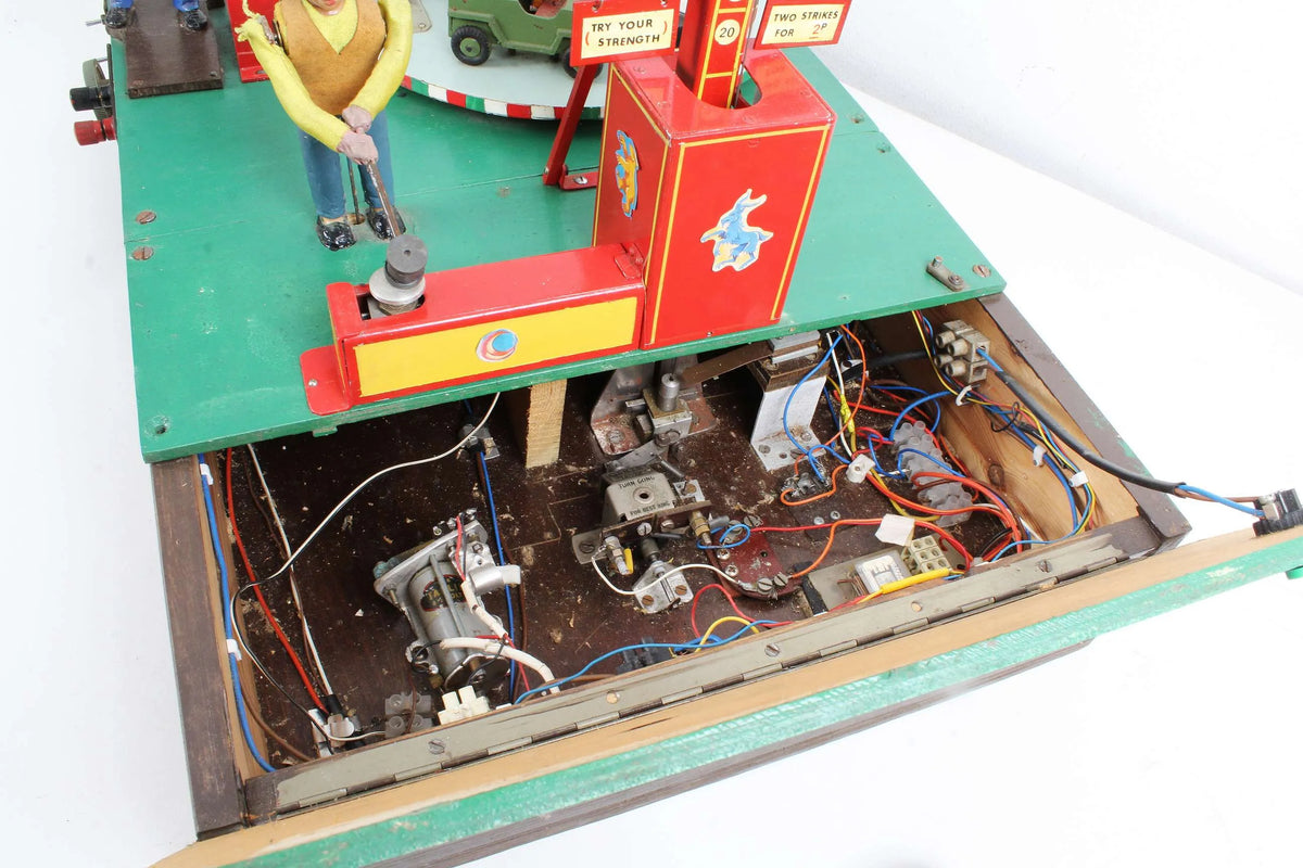 Fairground "Test your Strength" stall & juvenile roundabout