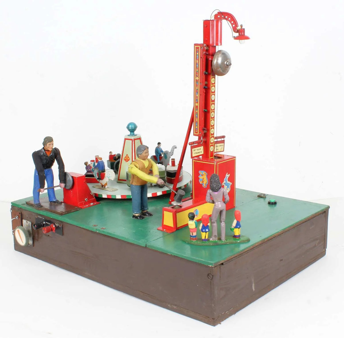 Fairground "Test your Strength" stall & juvenile roundabout