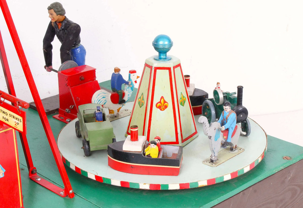 Fairground "Test your Strength" stall & juvenile roundabout