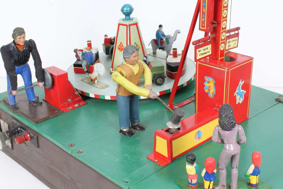 Fairground "Test your Strength" stall & juvenile roundabout