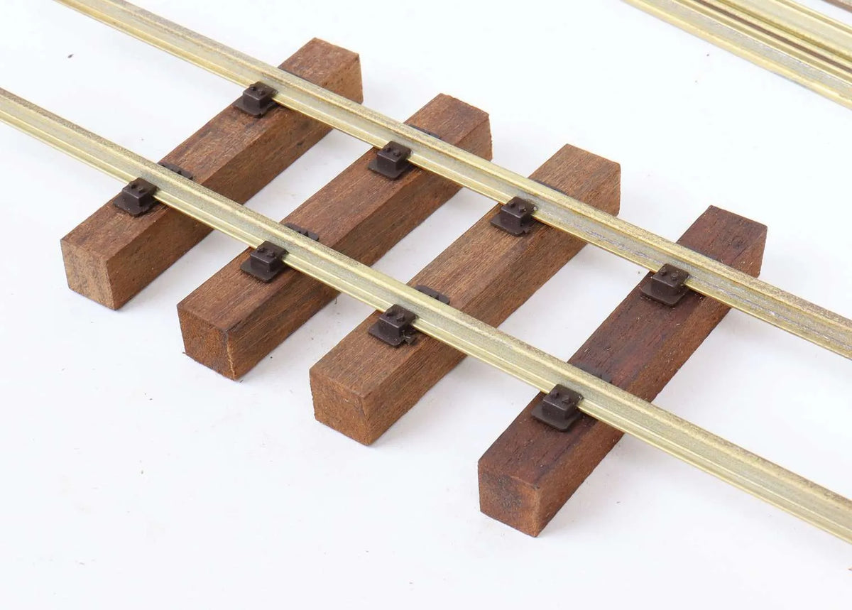 O-gauge brass rail, clips and sleepers