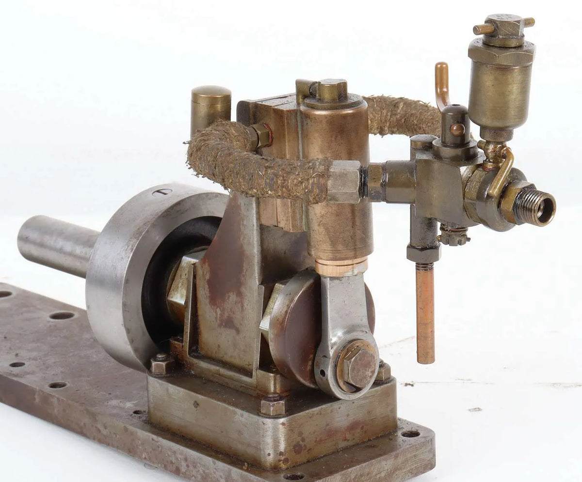 Oscillating engine with marine flywheel, propshaft and propeller