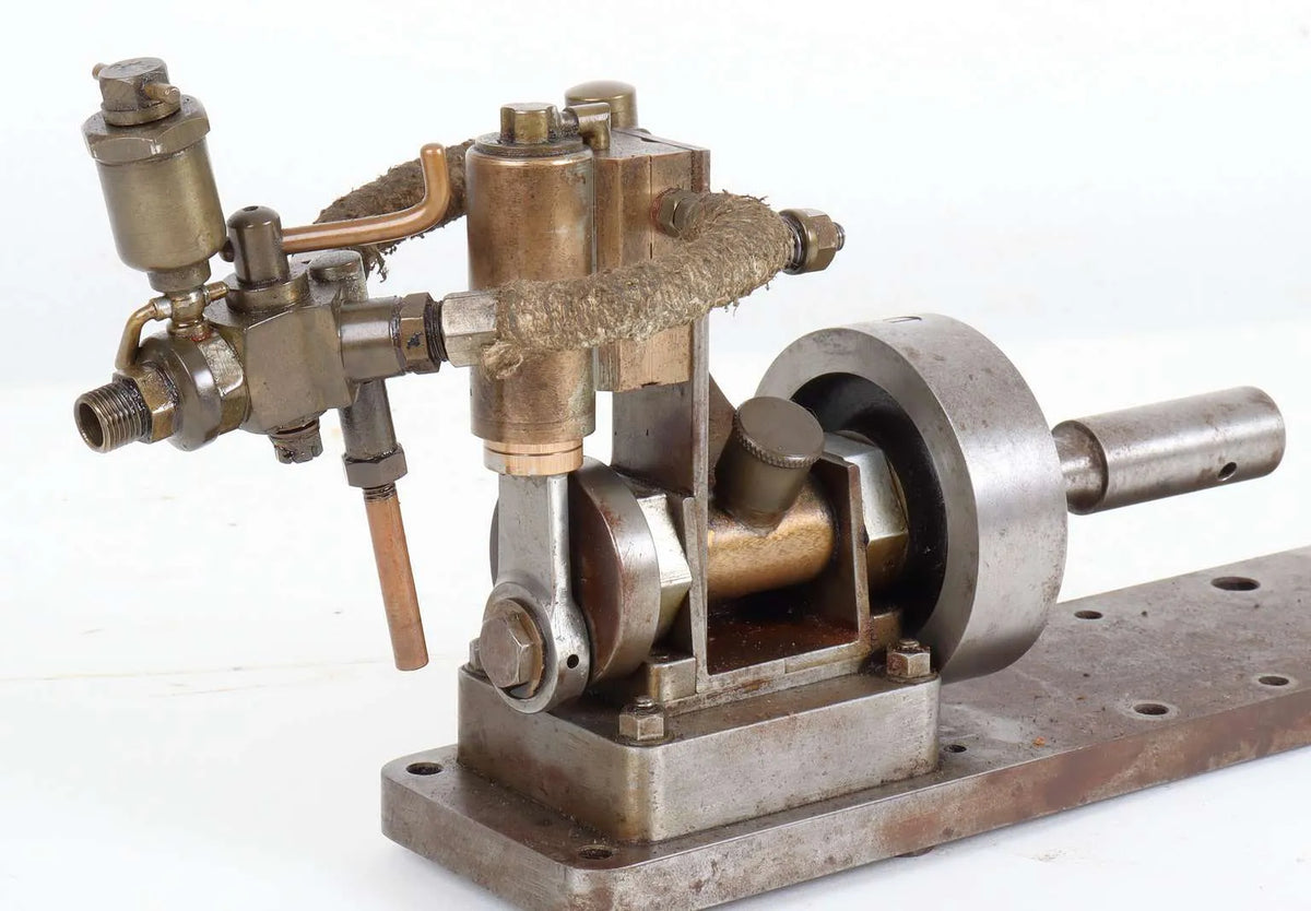 Oscillating engine with marine flywheel, propshaft and propeller