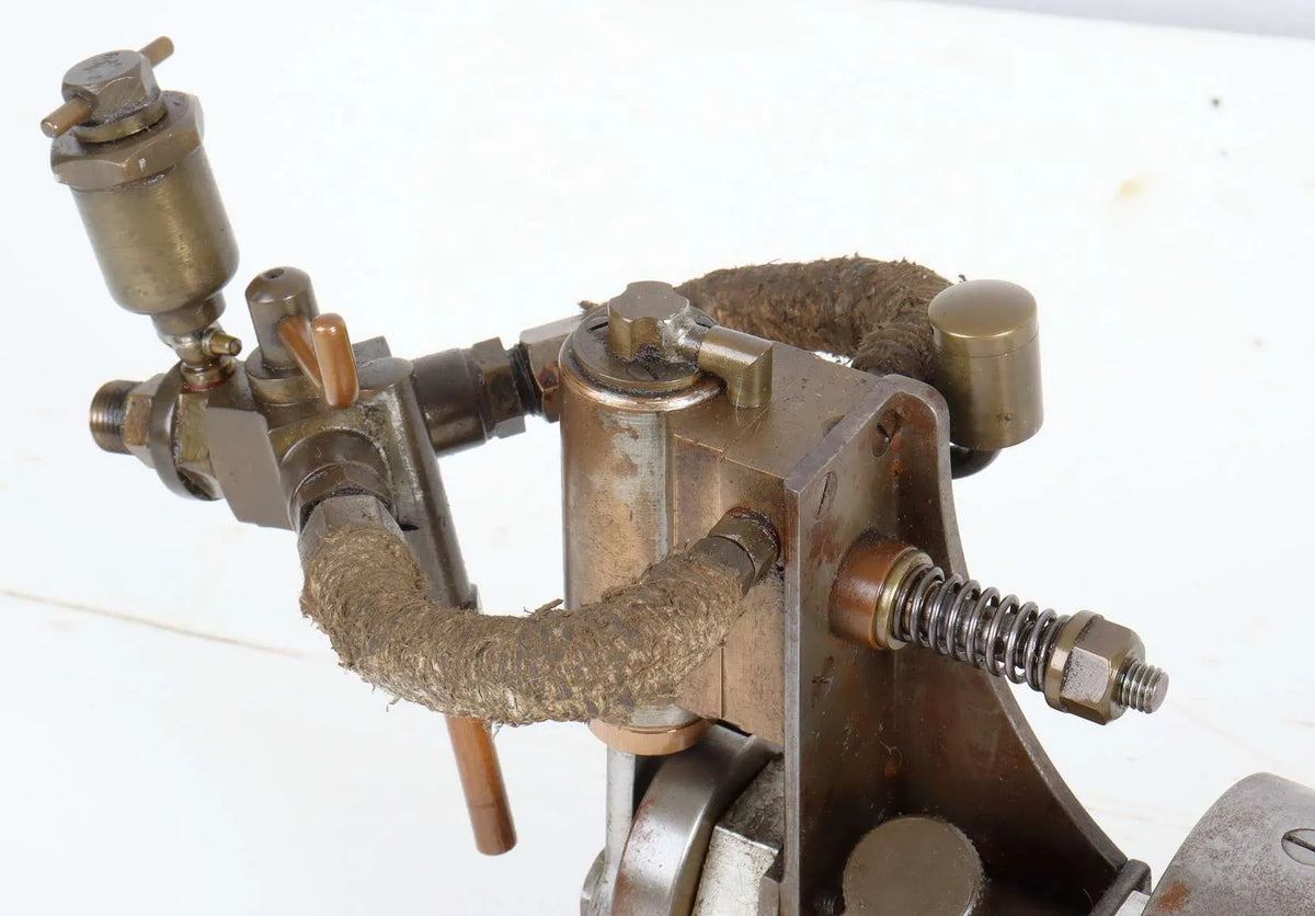 Oscillating engine with marine flywheel, propshaft and propeller