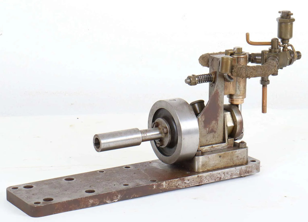 Oscillating engine with marine flywheel, propshaft and propeller