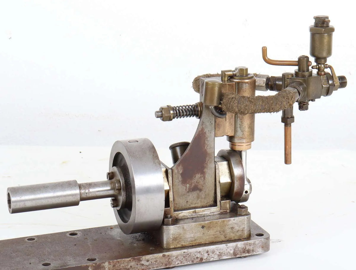 Oscillating engine with marine flywheel, propshaft and propeller