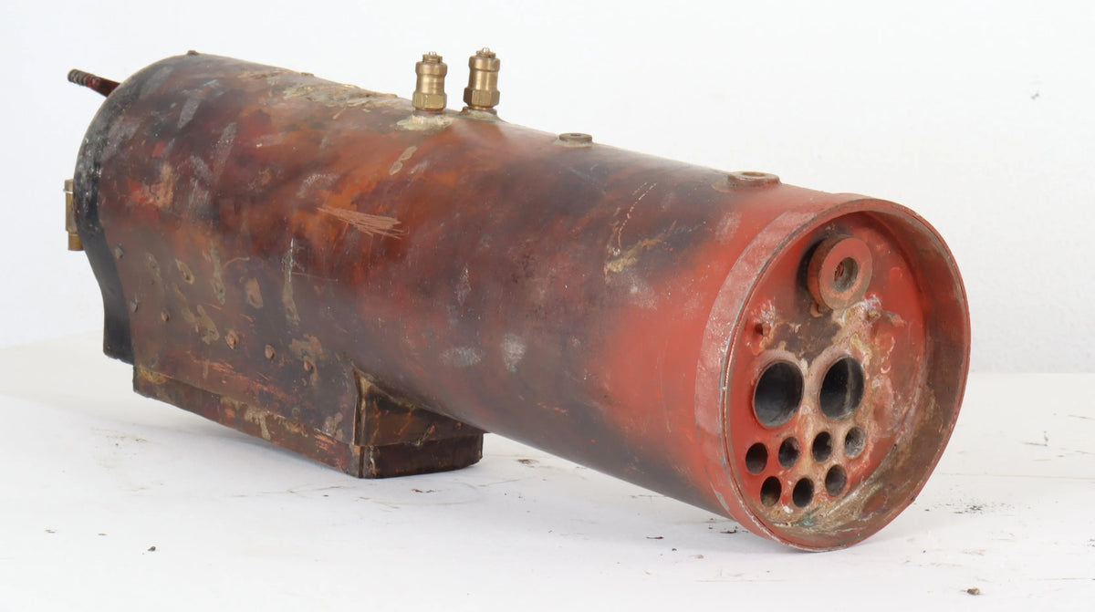 Three small locomotive boilers