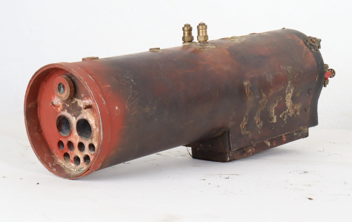 Three small locomotive boilers