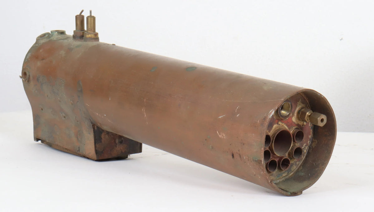 Three small locomotive boilers