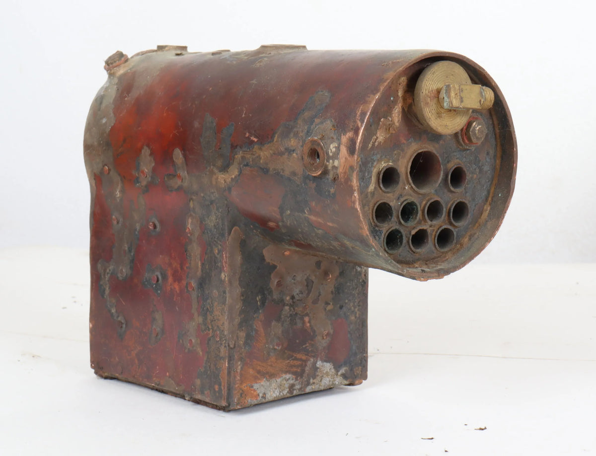 Three small locomotive boilers