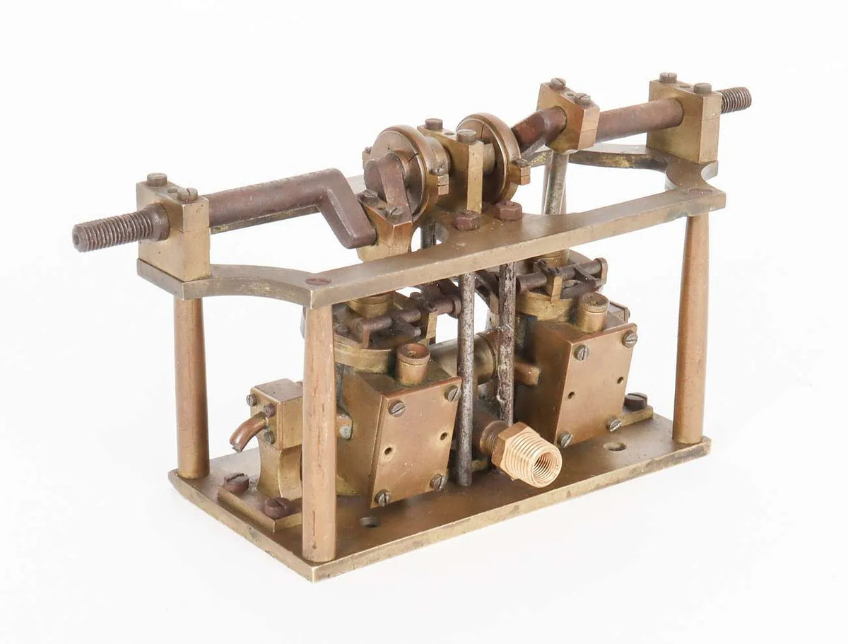 Oscillating twin cylinder vertical engine
