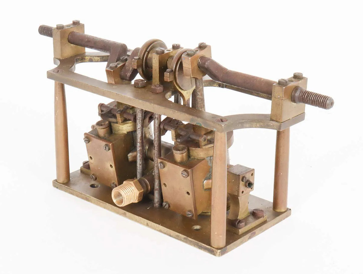 Oscillating twin cylinder vertical engine