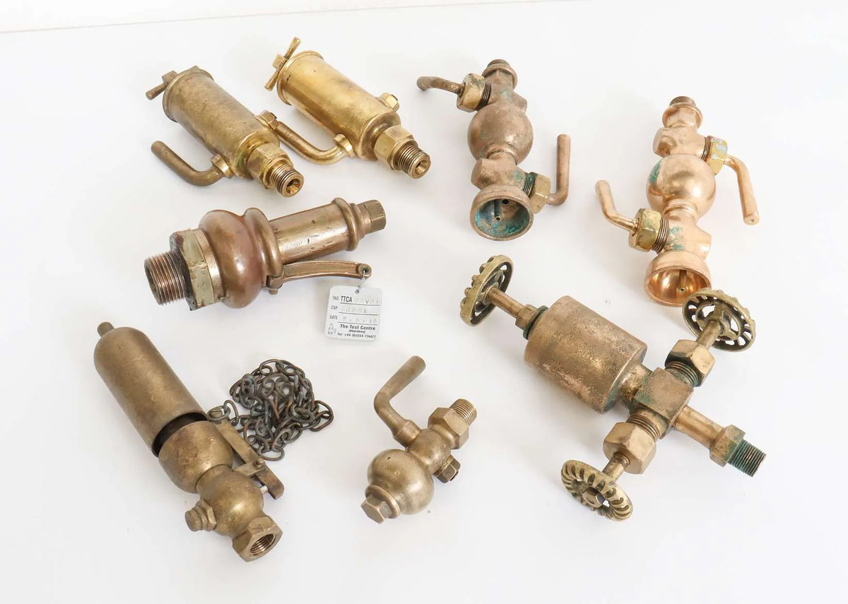 Collection of full-size lubricators, safety valve, whistle