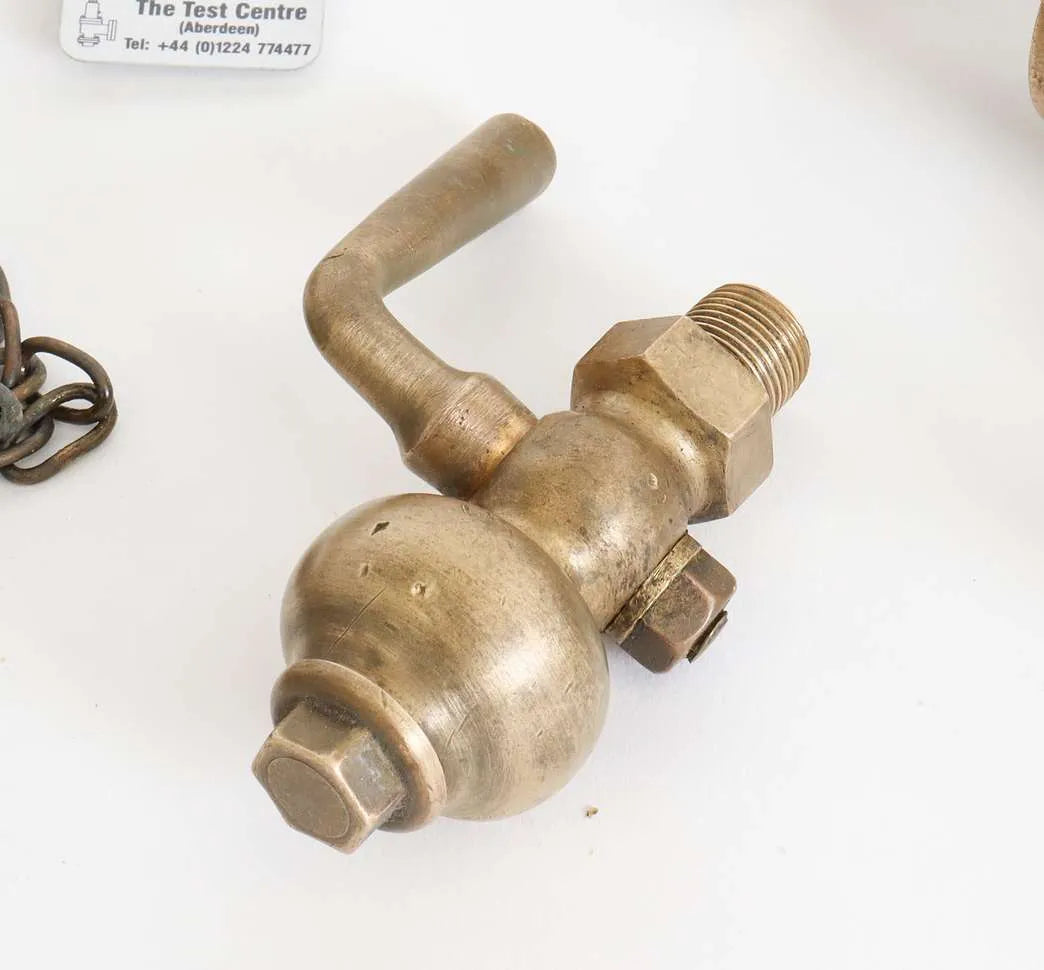 Collection of full-size lubricators, safety valve, whistle
