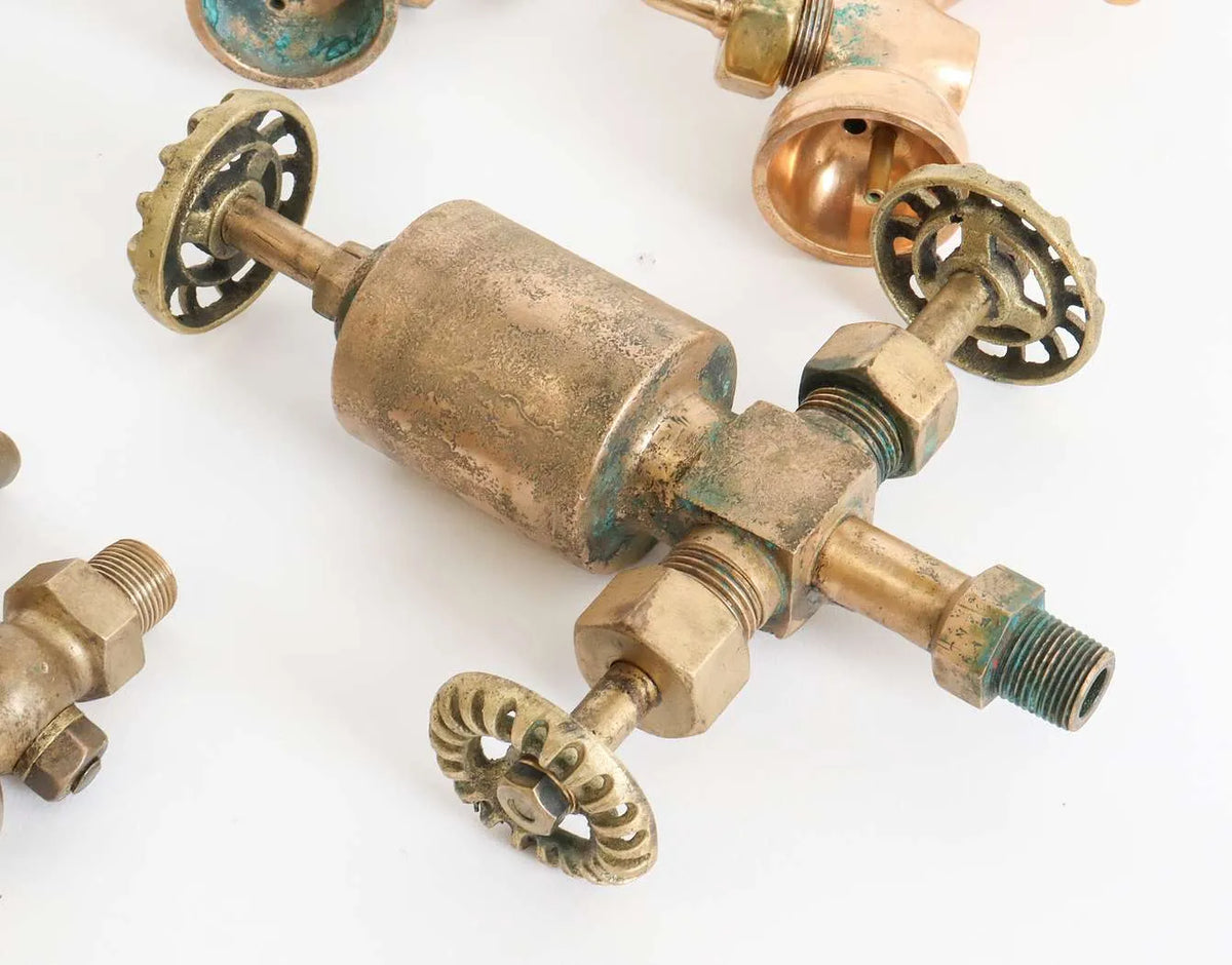 Collection of full-size lubricators, safety valve, whistle