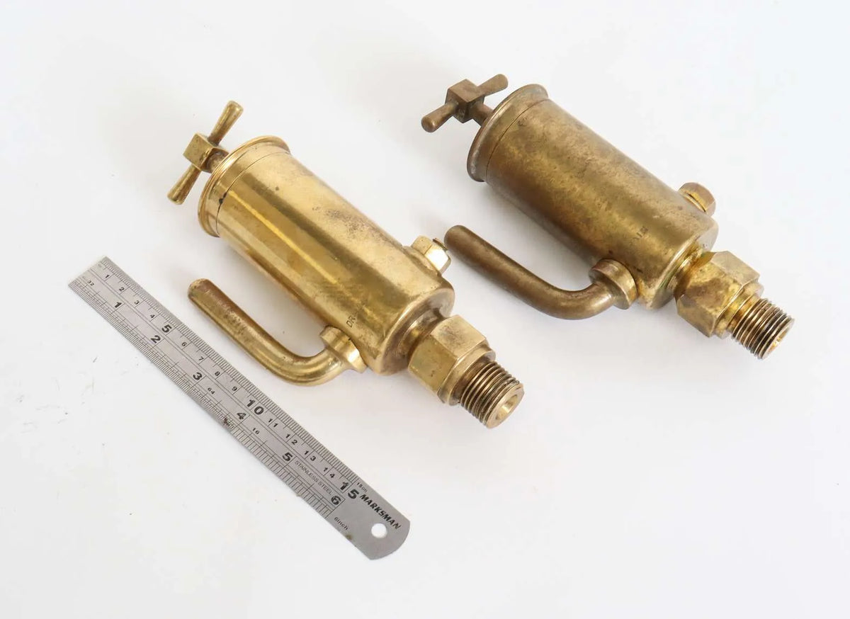 Collection of full-size lubricators, safety valve, whistle
