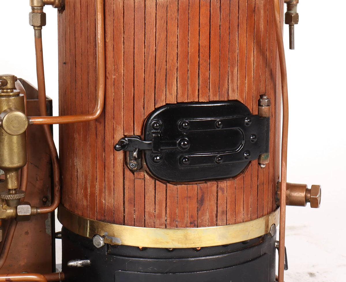 Coal-fired vertical boiler with steam pump
