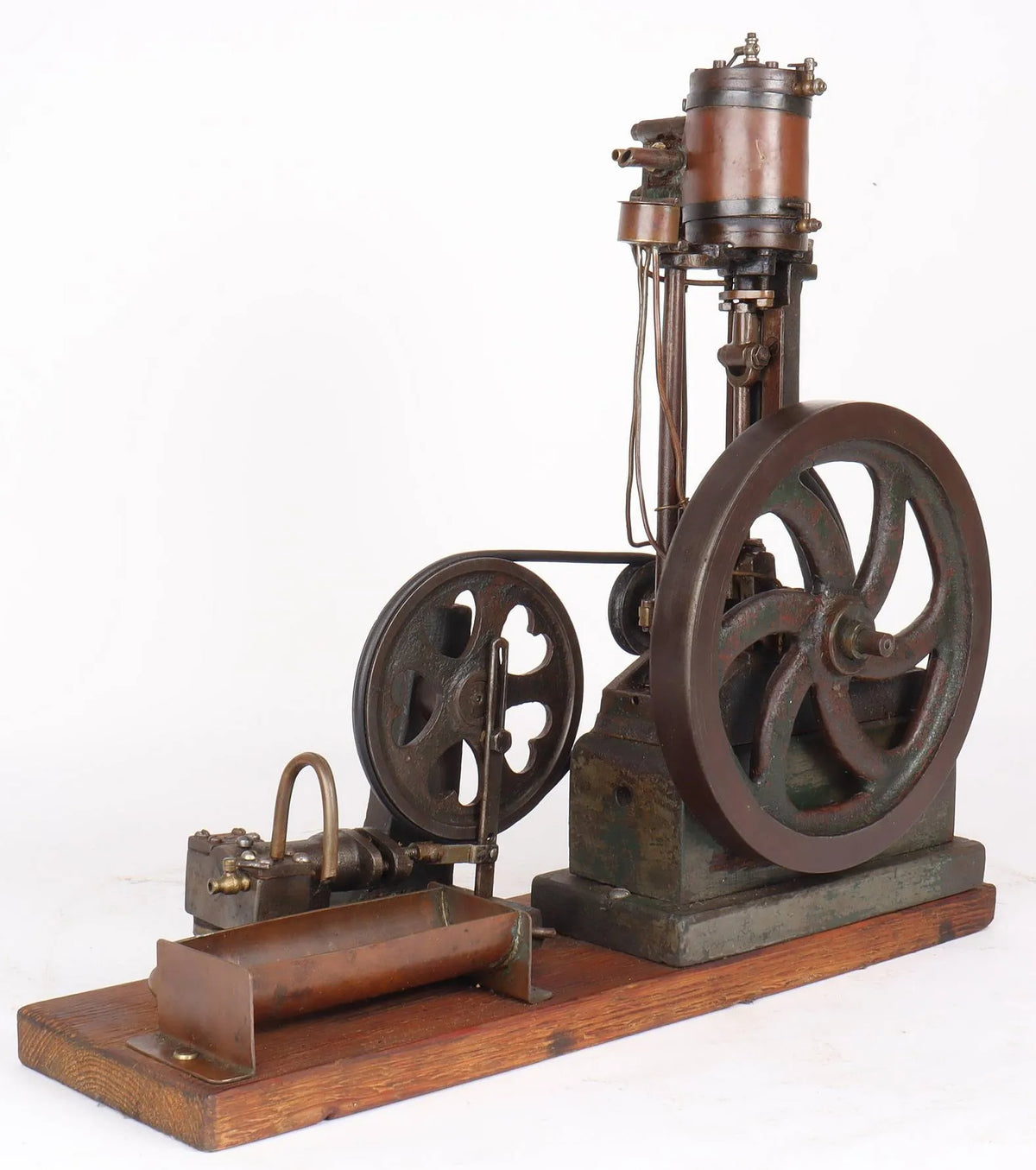 Vintage single cylinder vertical engine with pump