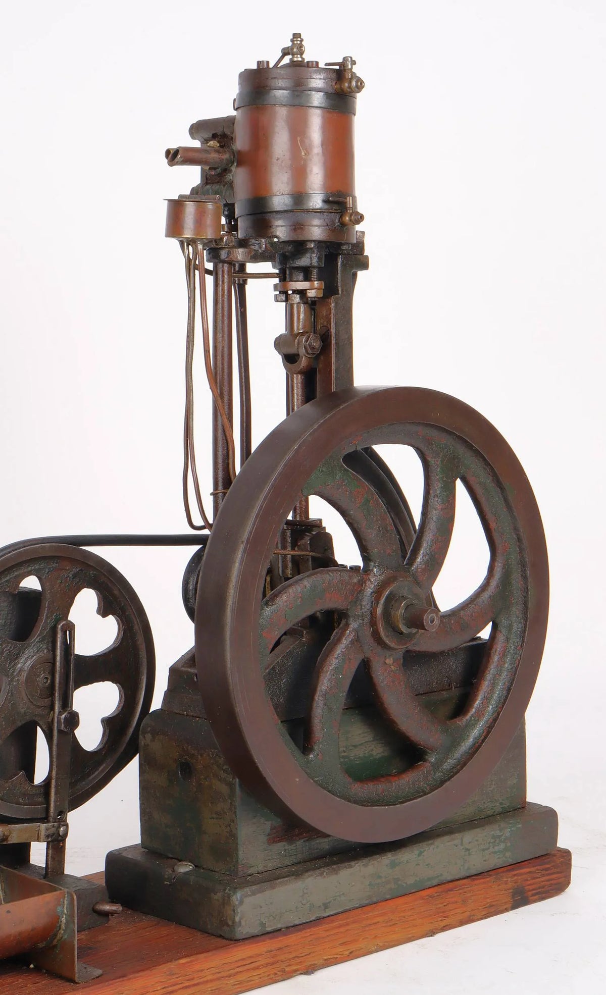 Vintage single cylinder vertical engine with pump