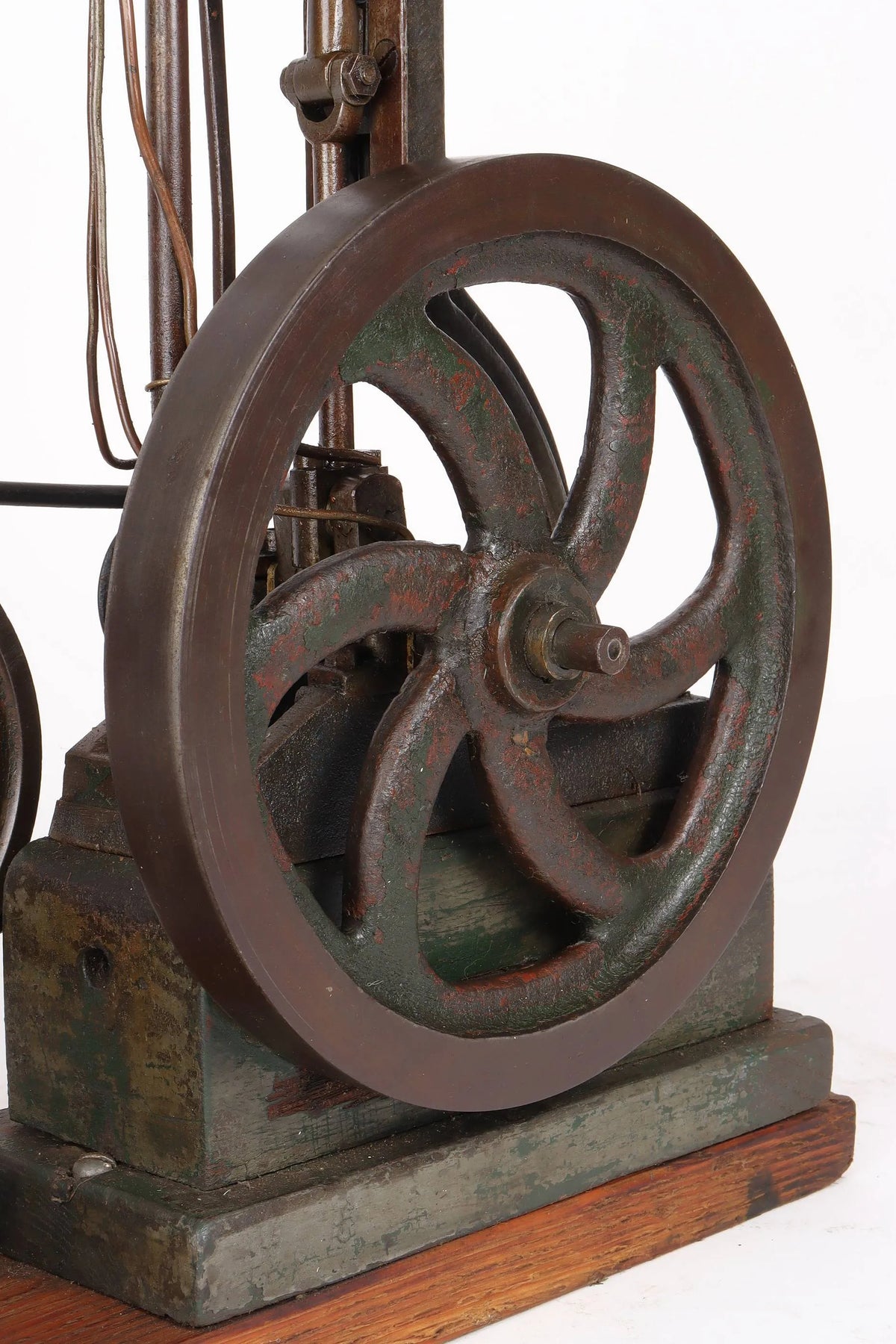 Vintage single cylinder vertical engine with pump