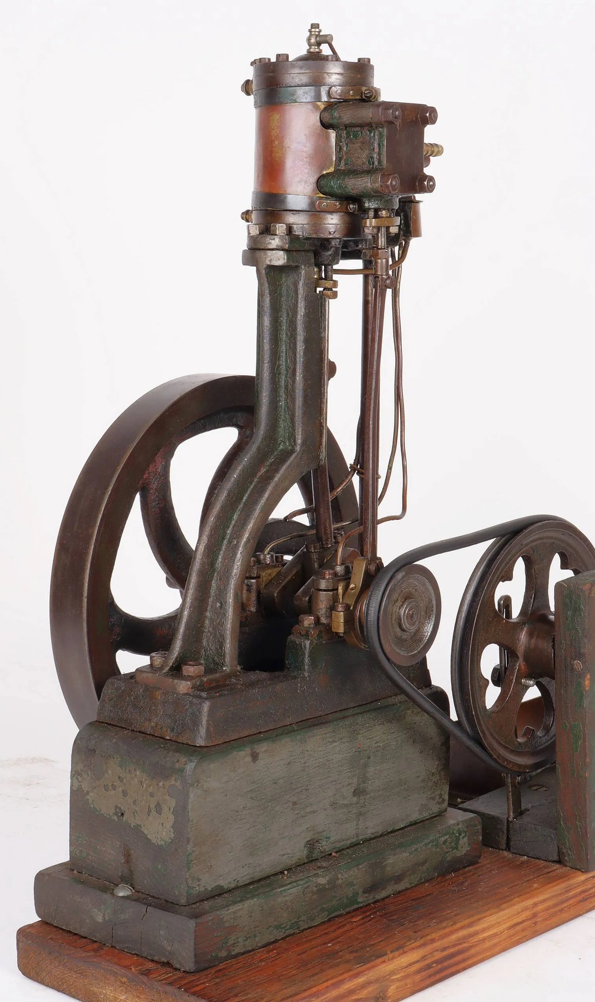 Vintage single cylinder vertical engine with pump