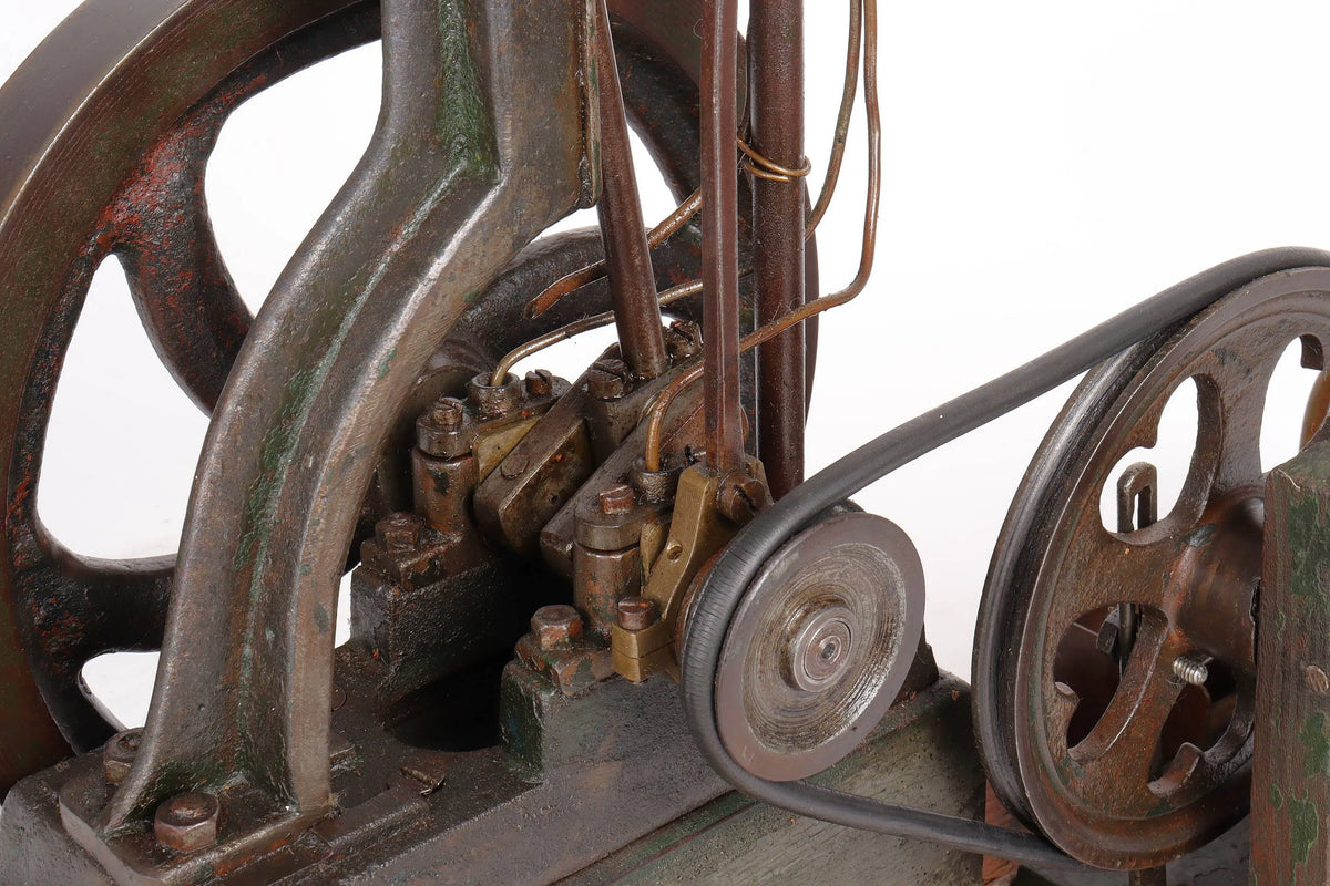 Vintage single cylinder vertical engine with pump