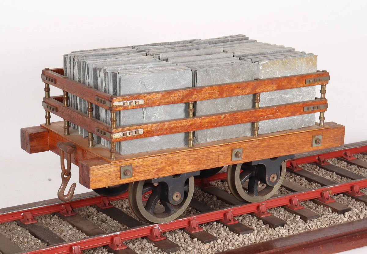 Four 5 inch narrow gauge wagons