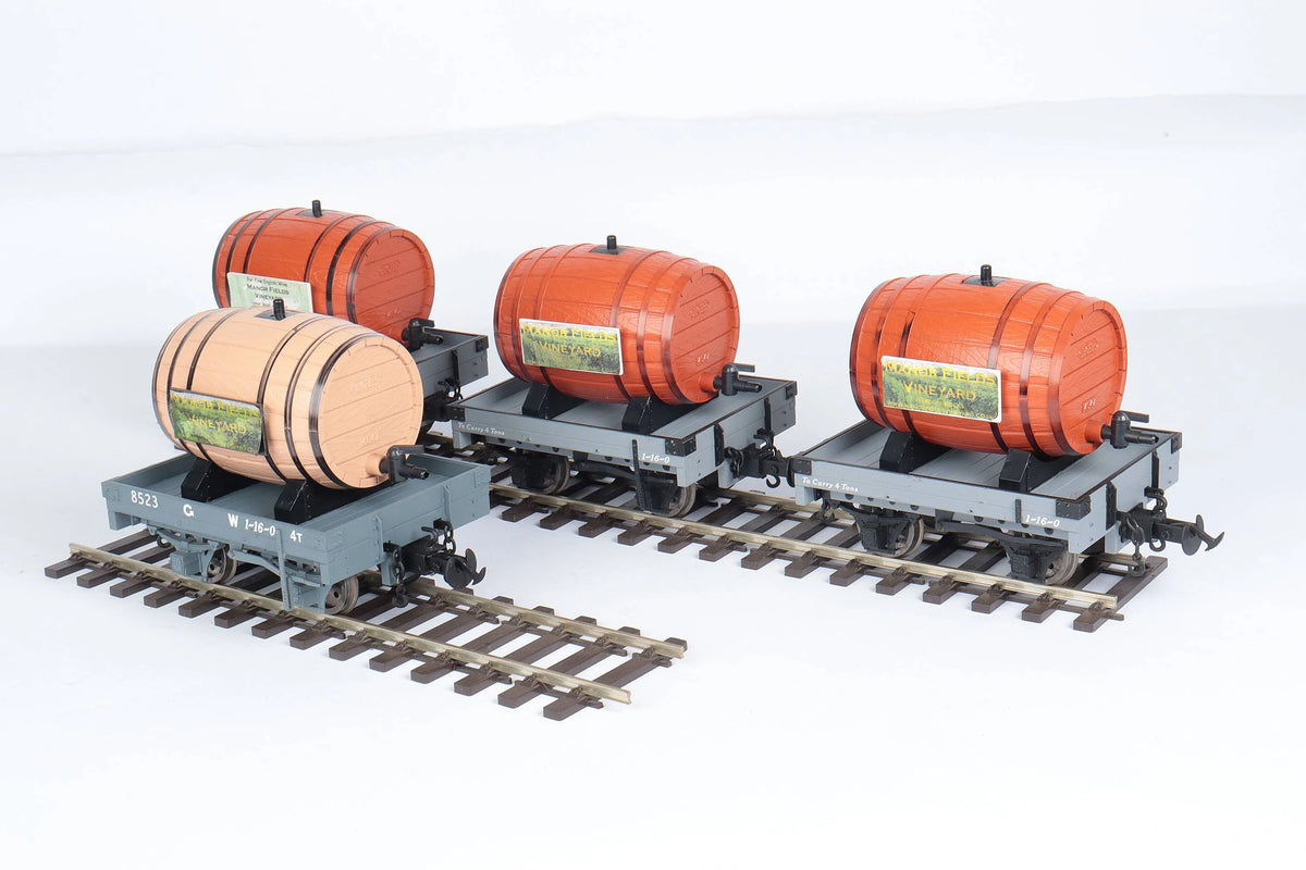 Four Accucraft W&L flat wagons with wine barrels