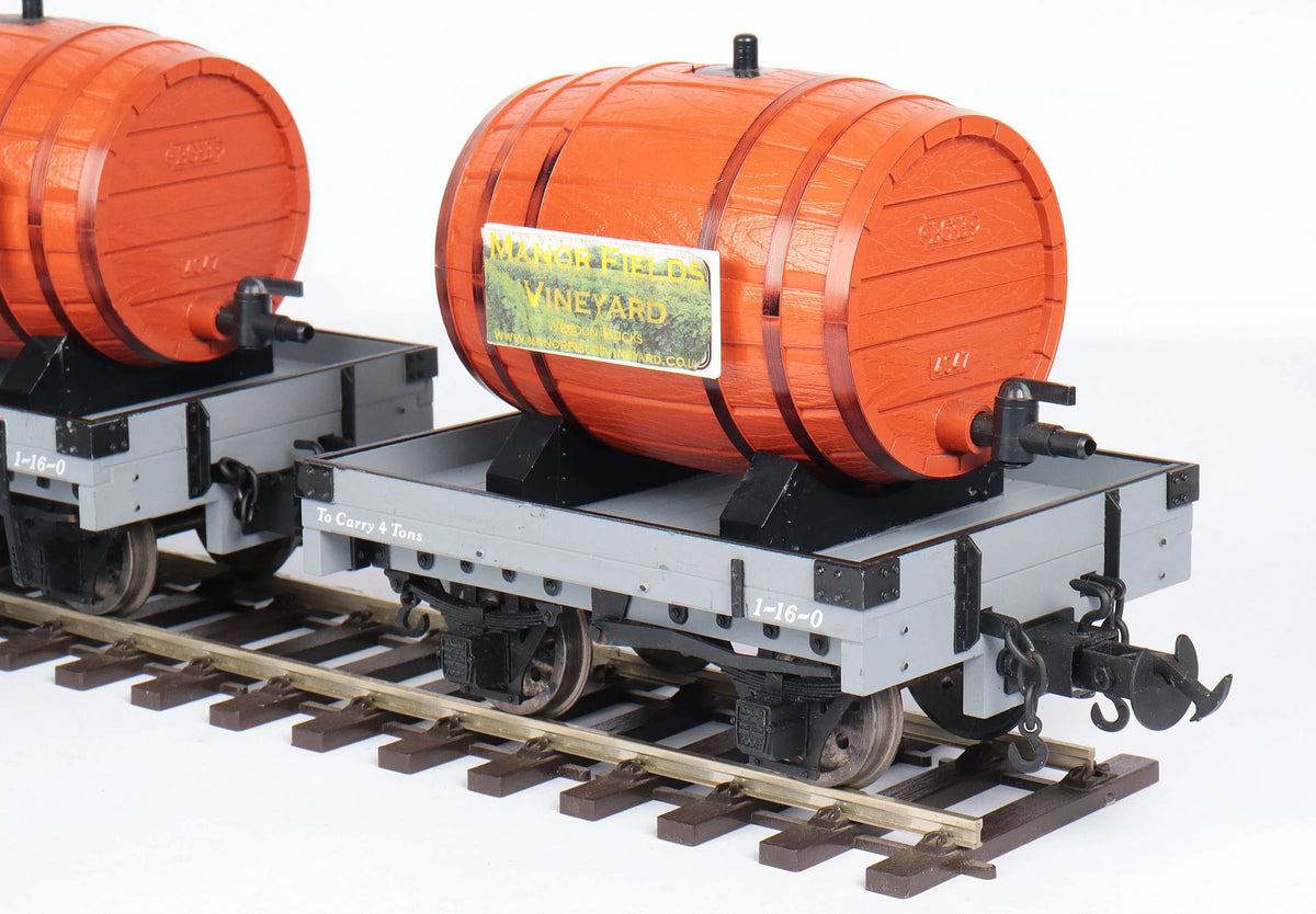 Four Accucraft W&L flat wagons with wine barrels