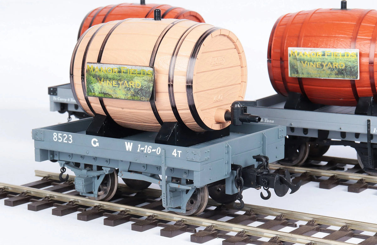 Four Accucraft W&L flat wagons with wine barrels