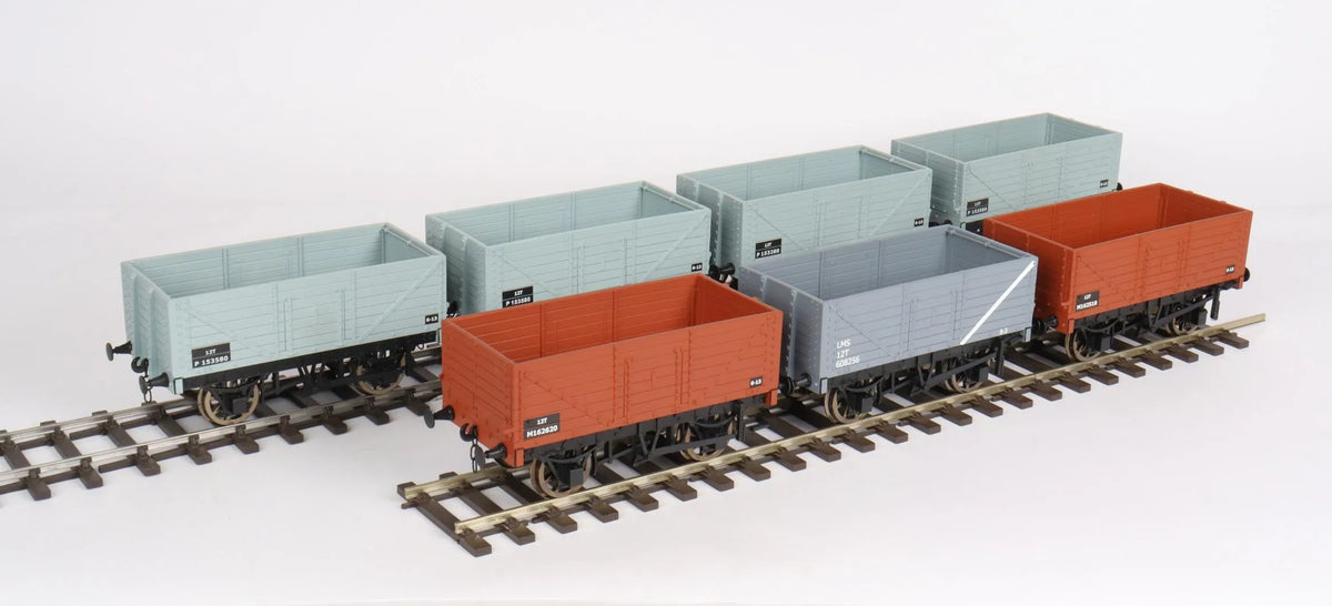 Seven 32mm Accucraft 7 plank wagons