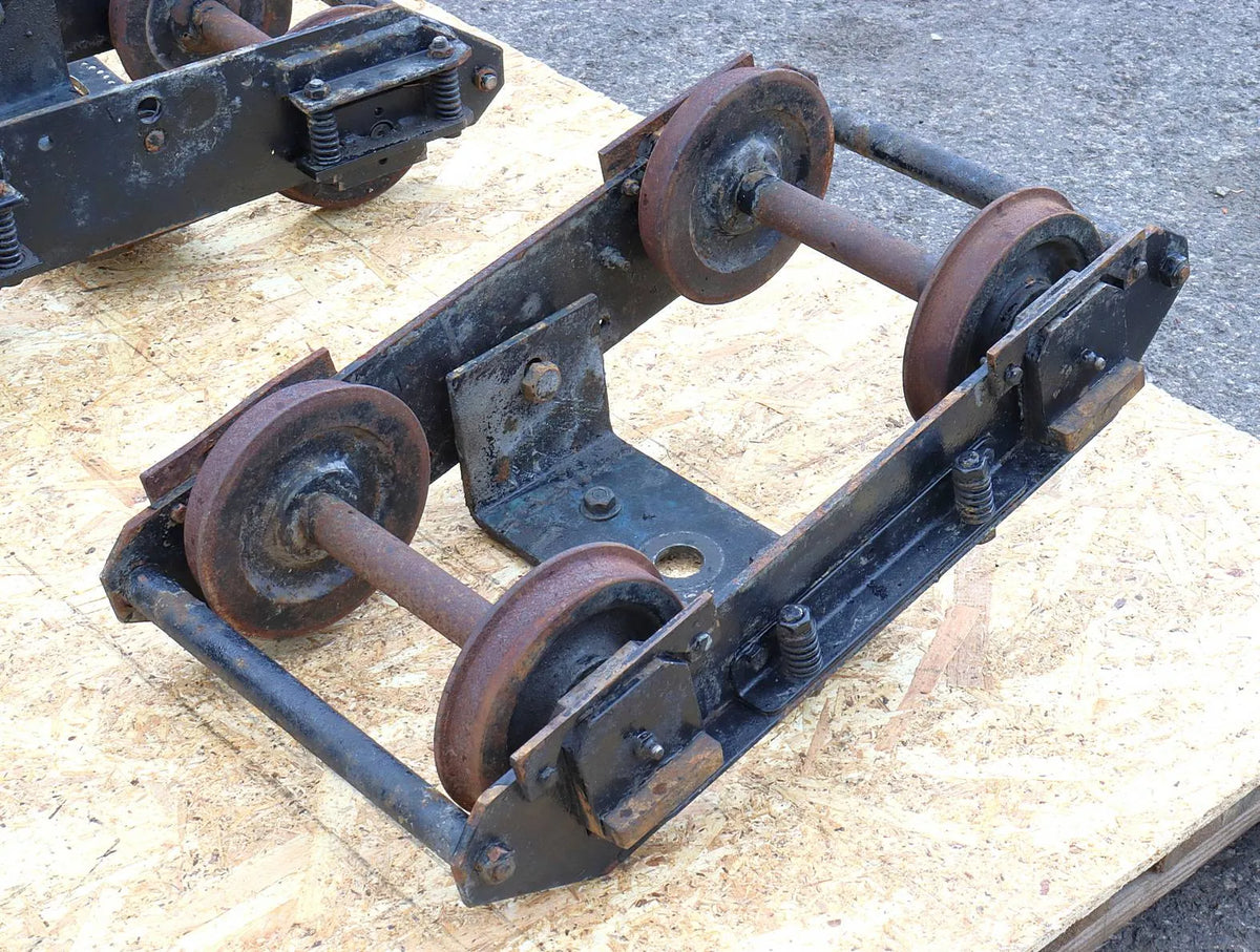 Four 7 1/4 inch gauge bogies