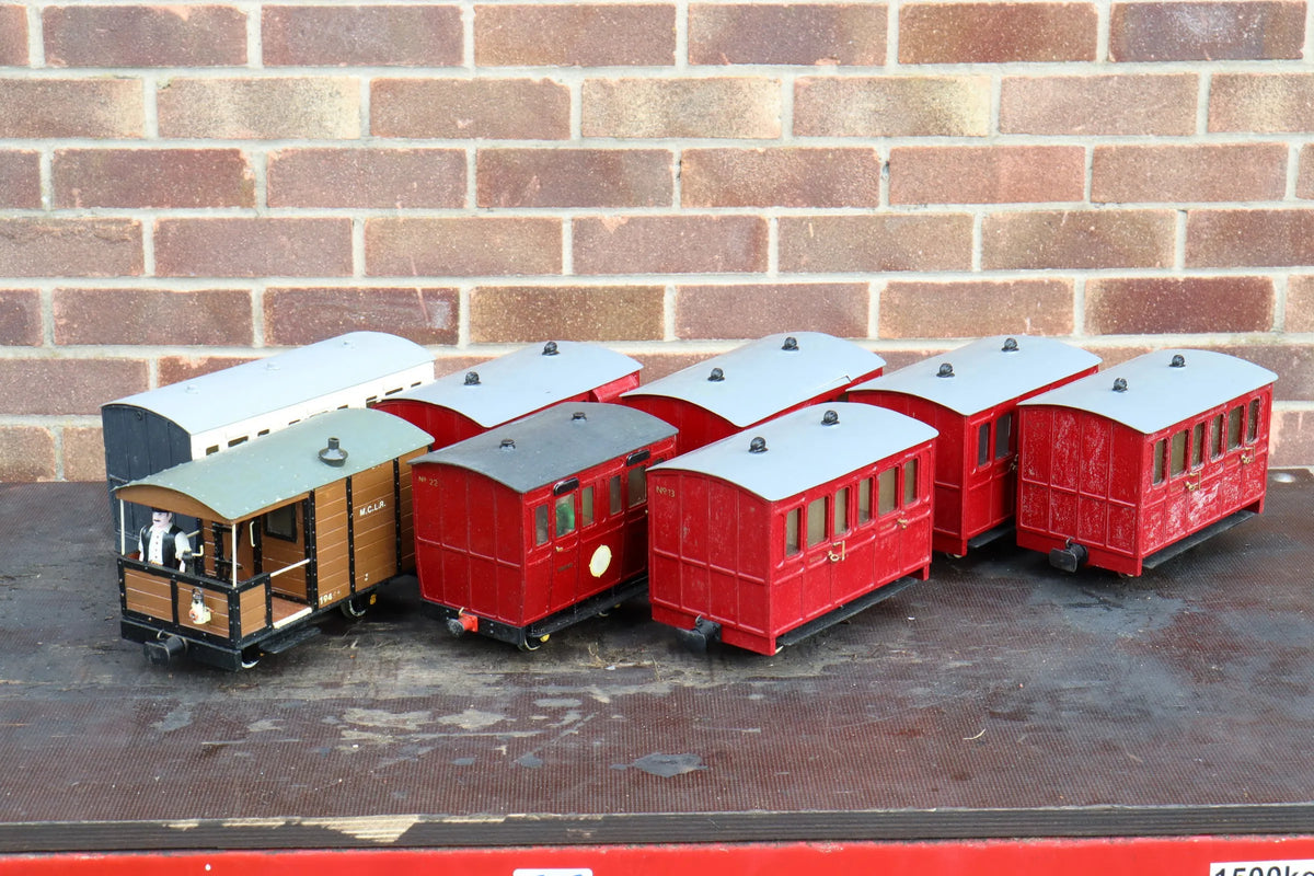 Seven 32mm gauge carriages