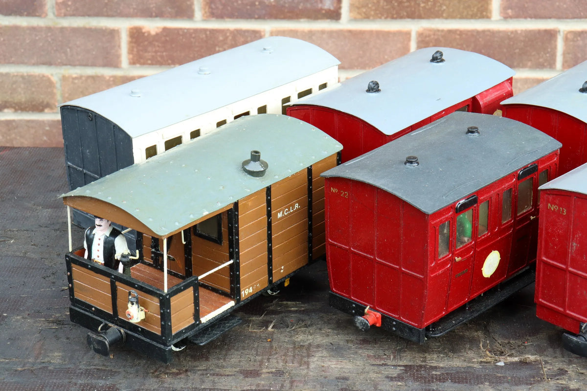 Seven 32mm gauge carriages
