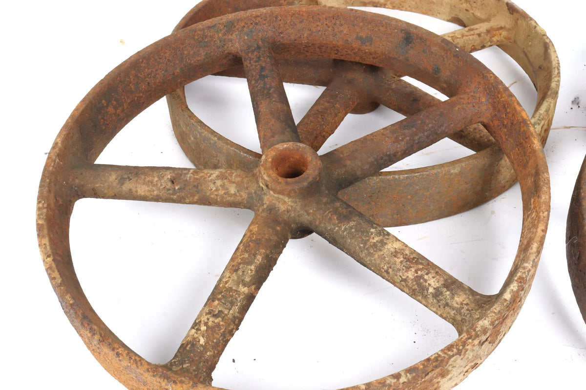 Four 12 inch cast iron wheels