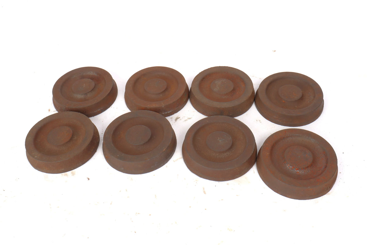 Eight cast iron wheels