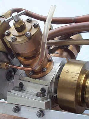 High speed V-twin marine engine and Scott boiler