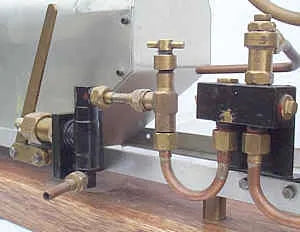 High speed V-twin marine engine and Scott boiler