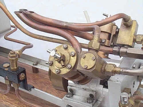 High speed V-twin marine engine and Scott boiler