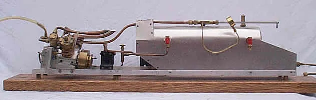High speed V-twin marine engine and Scott boiler