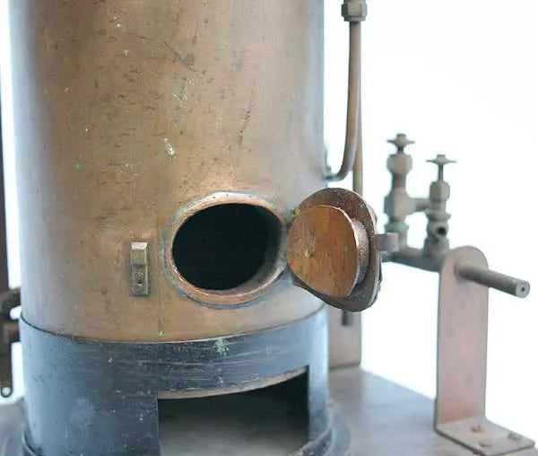 Vertical boiler with hand pump