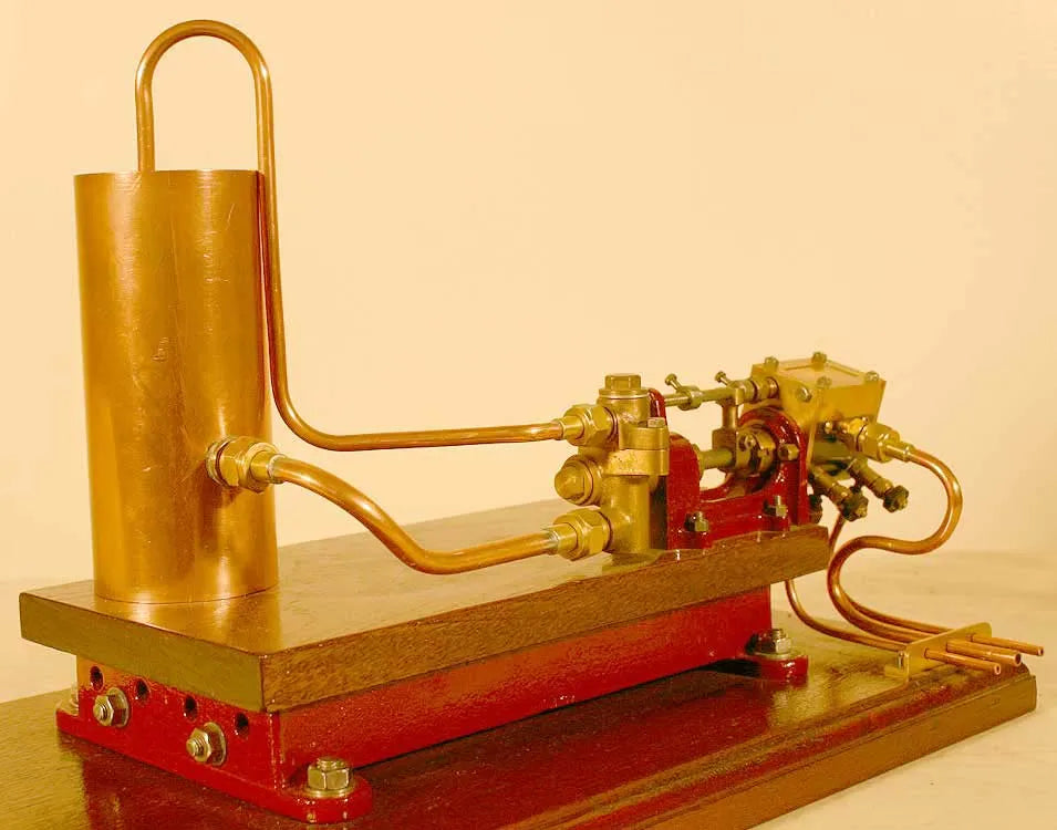 Stuart steam pump on base with water tank