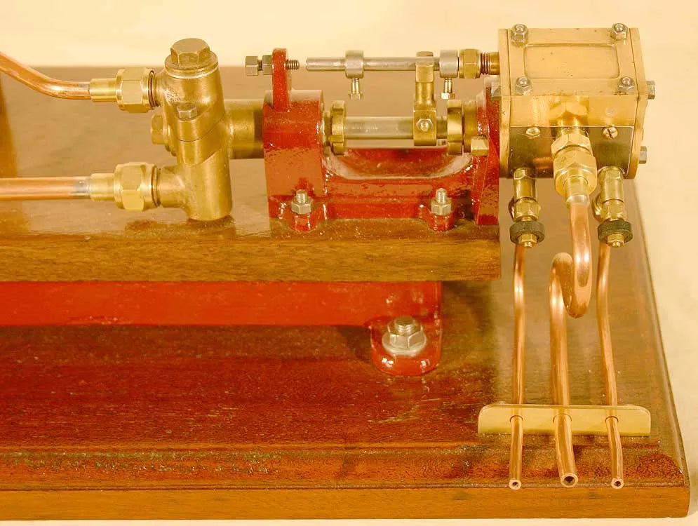 Stuart steam pump on base with water tank