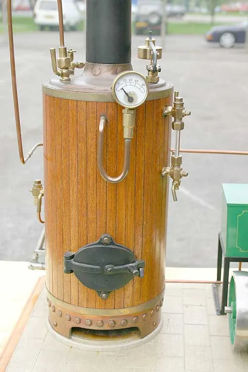 Coal-fired boiler with vertical engine